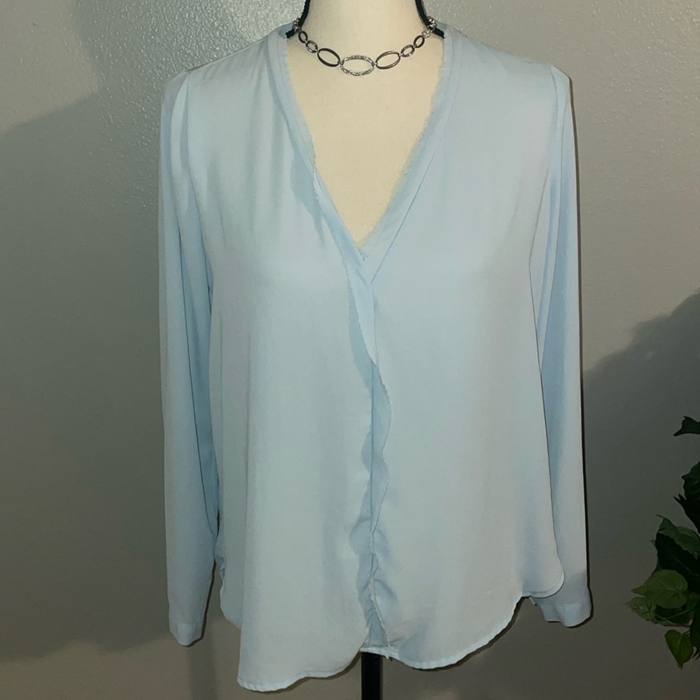 PLEIONE LIGHT BLUE BLOUSE.